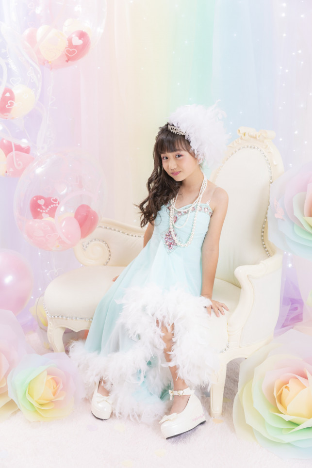 Child model Yune wearing a luxury dress