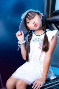 Yune posing at a event photoshoot