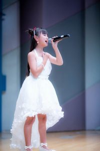 Yune at Tokyo Idol Theatre in a white dress